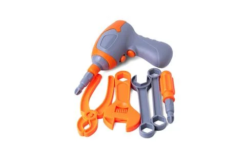 Assorted plastic toy tools set including drill wrench and pliers isolated o.. Stock Photos