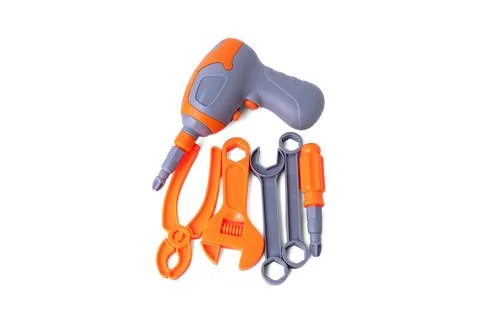 Assorted plastic toy tools set including drill wrench and pliers isolated o.. Stock Photos
