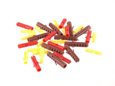 Assorted raw plugs on a white background. Stock Photos