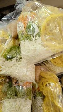 Assorted raw vegetables served with peanut sauce, boiled tofu, crackers Stock Photos