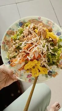 Assorted raw vegetables served with peanut sauce, boiled tofu, crackers Stock Photos