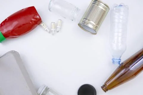 Assorted Recyclable Items on White Background Fotos de archivo