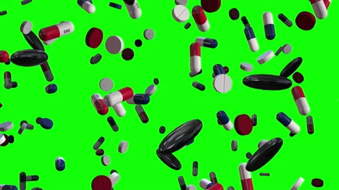 Assorted Red and Blue Pills Raining Down on Green Alpha Stock Footage 132166430