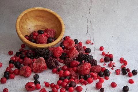 Assorted red berries in bulk Fotos de archivo