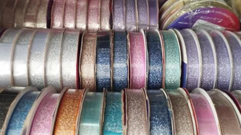 Assorted Rolls Of Colorful Ribbons Stock Photos