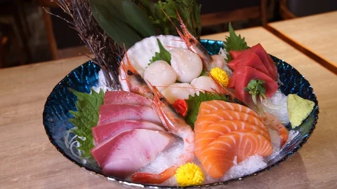 Assorted sashimi with ice, slow round track shot Stock Footage 127749737
