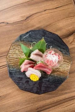 Assorted sashimi platter with garnish Stock Photos