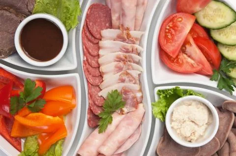 Assorted sausages and vegetables 스톡 사진
