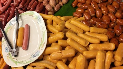 Assorted Sausages Displayed at Thai Night Market Street Food Stall Stock-Footage 325854247