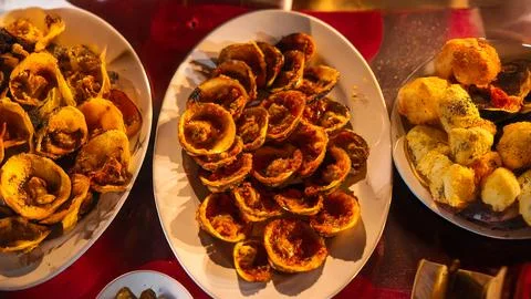 Assorted Seafood Feast With Grilled Shellfish and Side Dishes Stock Photos