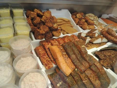Assorted selection of smoked fish in fish shop Stock Photos