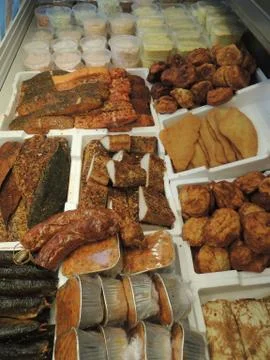 Assorted selection of smoked fish in fish shop Stock Photos