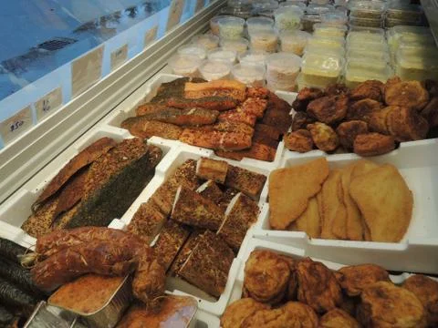 Assorted selection of smoked fish in fish shop Stock Photos