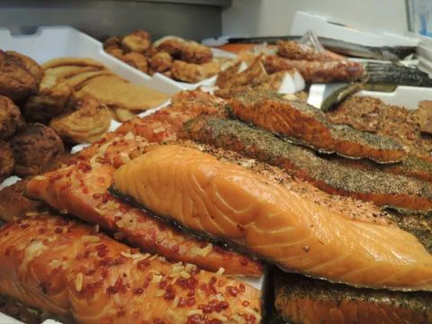 Assorted selection of smoked fish in fish shop Stock Photos