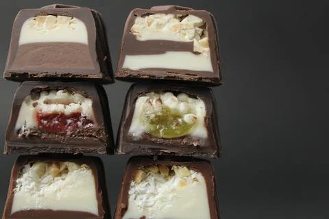 Assorted set of chocolate case candies with vanilla praline filling and jel.. Stock Photos