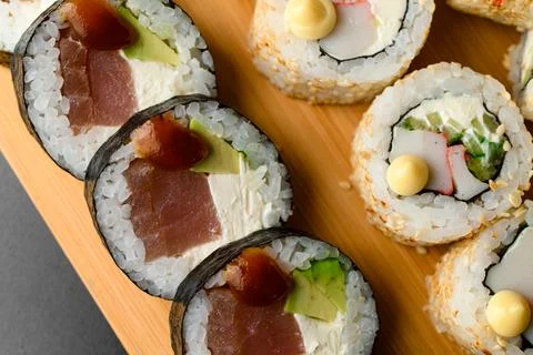 Assorted set of various rolls with tuna, avocado, crab sticks and cucumber Stock-Fotos