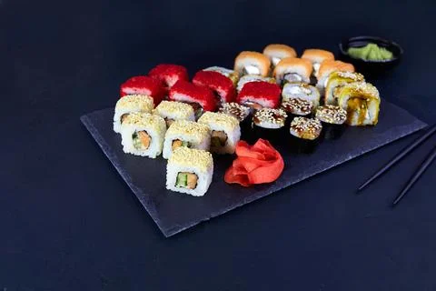 Assorted set of various sushi rolls with tuna, salmon, eel, avocado Foto stock