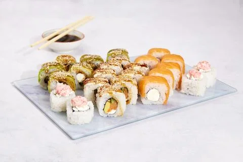 Assorted set of various sushi rolls with tuna, salmon, eel, avocado Stock Photos