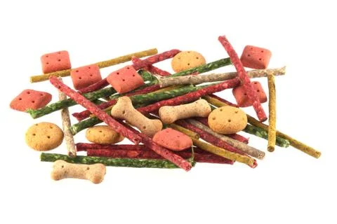 Assorted shaped dog biscuits and chews. Stock Photos