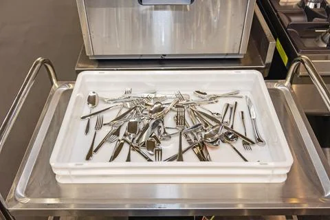 Assorted Silverware in Crate Stock-Fotos