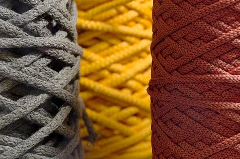 Assorted skeins of multi-colored braided synthetic cord Stock Photos