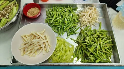 Assorted Sliced Fresh Vegetables and Sesame Seeds for Thai Food Cooking Stock Photos