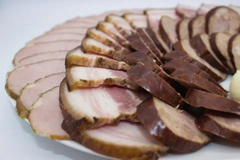Assorted Slices of Smoked Meats Stock Photos