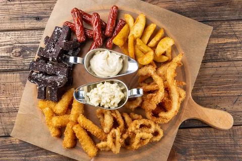 Assorted snacks for beer Stock Photos
