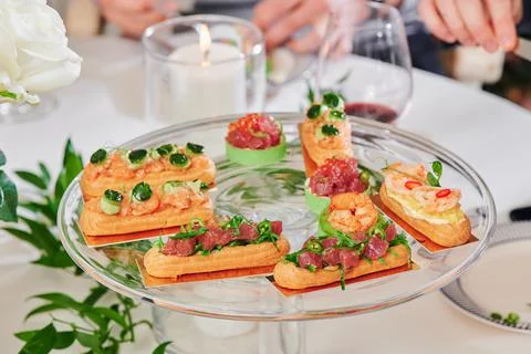 Assorted snacks on a festive New Year's table. Beautiful catering Stock Photos