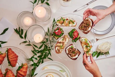 Assorted snacks on a festive New Year's table. Beautiful catering Stock Photos