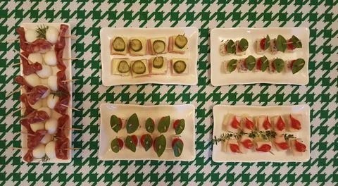 Assorted snacks in printed fabric Stock Photos