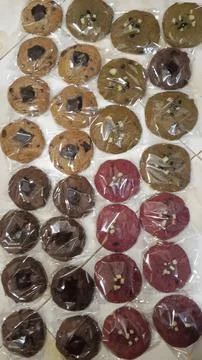 Assorted Soft Baked Cookies Wrapped in Plastic Packaging Stock Photos