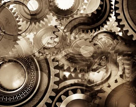 Assorted steel cogs Stock Photos