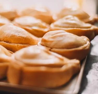 Assorted stuffed empanadas typical of South America Stock Photos