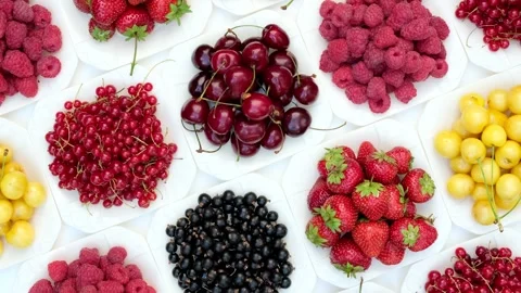 Assorted Summer Berries And Cherries Rotating Top View Flat Lay 스톡 동영상 344051473