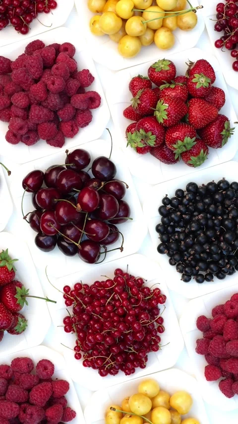 Assorted Summer Fruit And Berries In Bowls Vertical Video 스톡 동영상 345086921