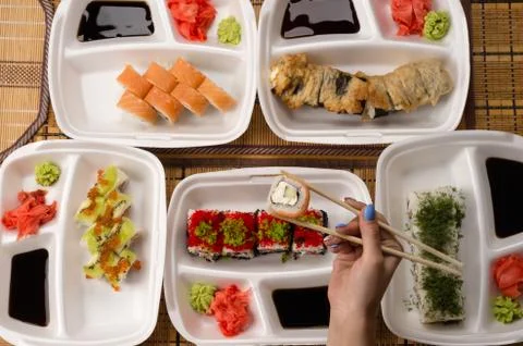 Assorted sushi and rolls on the table Stock Photos