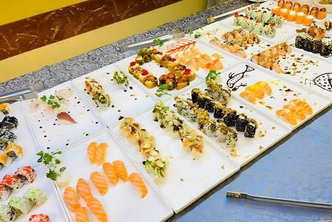 Assorted Sushi Platter Display on a Buffet Table. Stock Photos