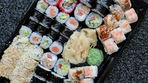 Assorted sushi, rolls set traditional Japanese and Asian food Stock Footage 164363287