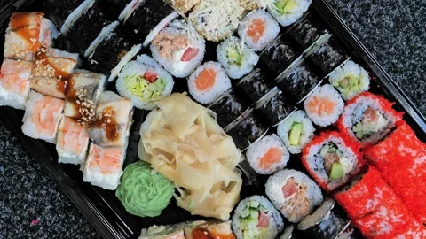 Assorted sushi, rolls set traditional Japanese and Asian food Stock Footage 164363566