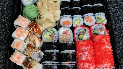 Assorted sushi, rolls set traditional Japanese and Asian food Stock Footage 164363745