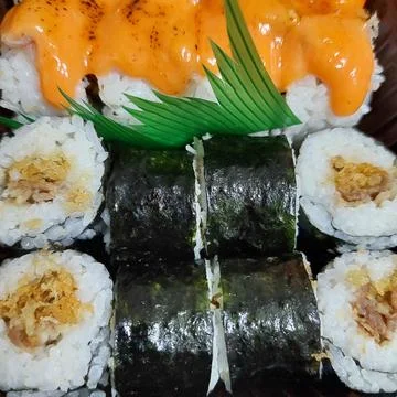 Assorted sushi served in a container Stock Photos