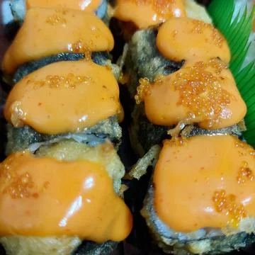 Assorted sushi served in a container Stock Photos