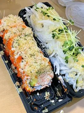 Assorted sushi set, featuring a variety of traditional Japanese dishes. Per.. Stock Photos