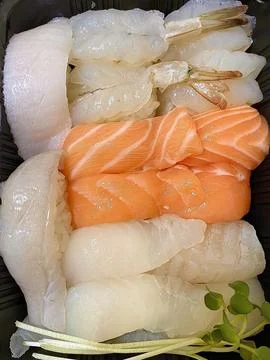 Assorted sushi set, featuring a variety of traditional Japanese dishes. Per.. Stock Photos