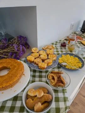 Assorted Sweet and Savory Breakfast Buffet on a Sideboard Stock Photos
