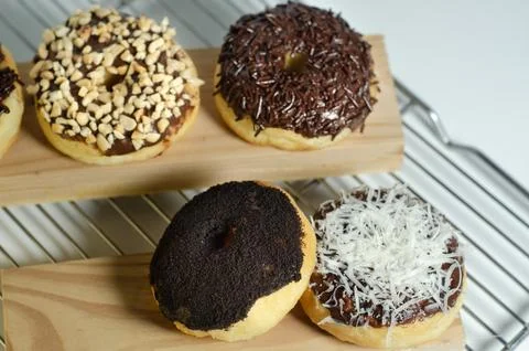 Assorted Sweet Donuts Ready for Enjoyment Stock Photos