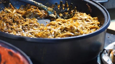 Assorted tasty chinese dishes on table with steam and fresh ingredients Stock Footage 332623418