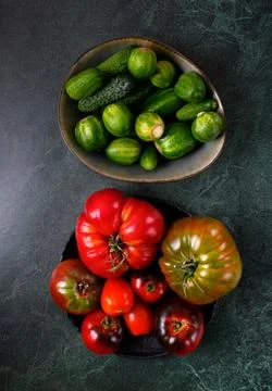 Assorted tomatoes and cucumbers of different colors Stock-Fotos