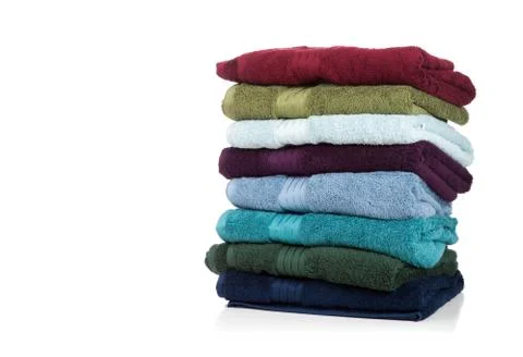 Assorted towels on white with copy space Stock Photos